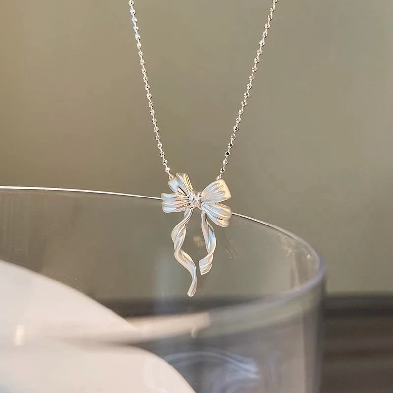 Elegant Silver Bow Necklace